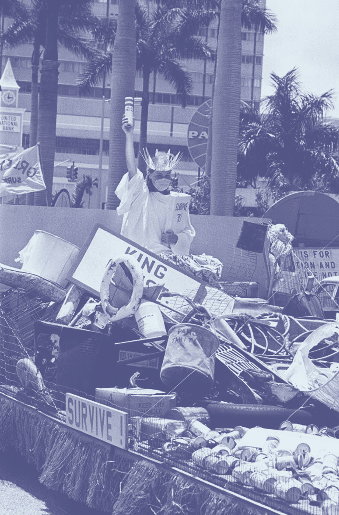 Color_A woman dressed as the Statue of Liberty poses on a float full of trash during Earth Day observances in Florida in 1970. AP Photo copy.jpg